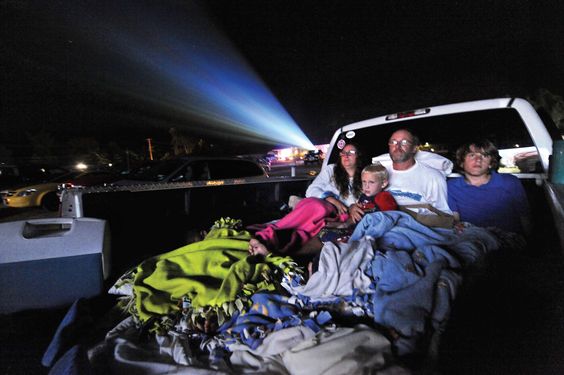 AMANDA MORRISON / NNY Living CAPTION The MacFarland family enjoys watching "Brave" from the back of their pick up truck.